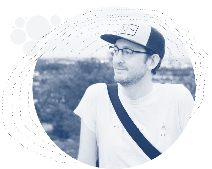 Black and white circular photo of Duncan Geere